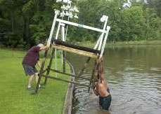 jet ski hoist being removed from the water